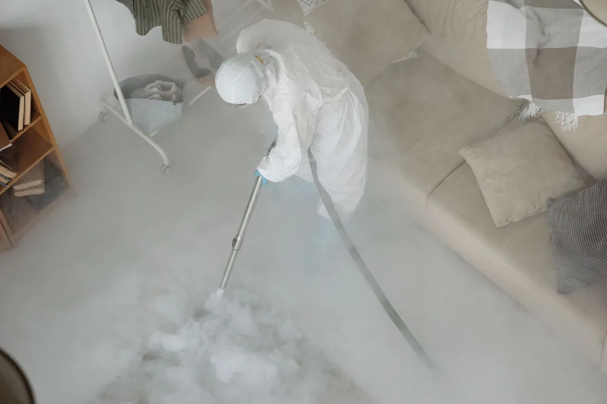 Biohazard cleanup technician in protective equipment, El Dorado / Oates Prairie, Houston, TX